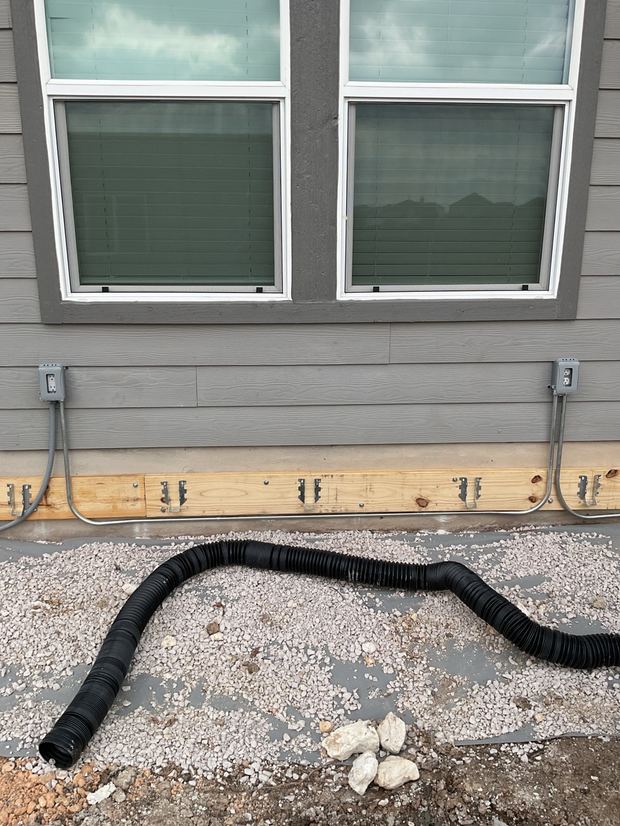 Weather-resistant GFCI outlets with in-use covers installed for a new deck
