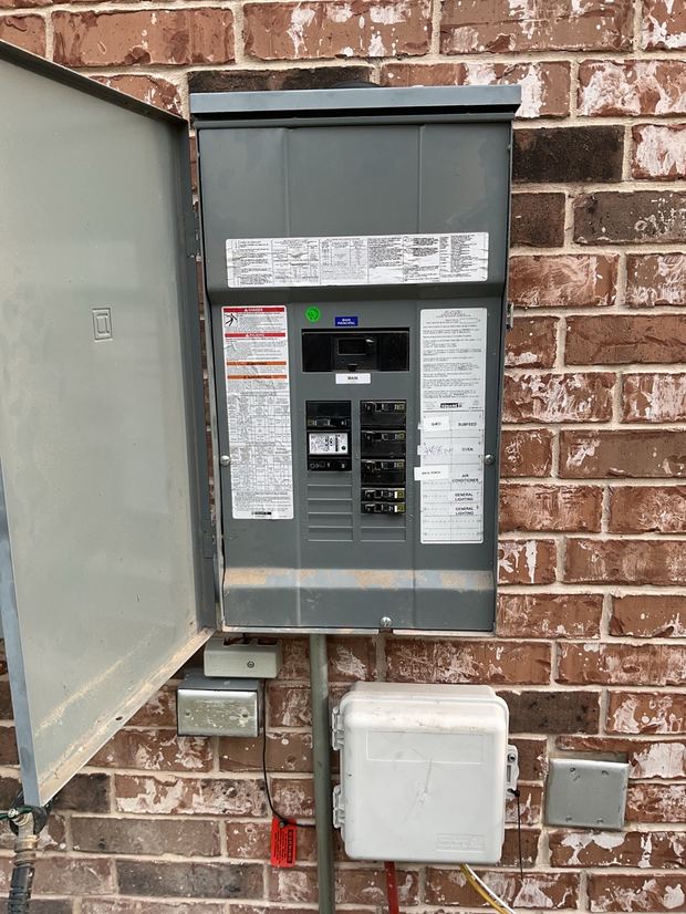 Square D panel installed with rigid conduit run to wire a shed in Round Rock